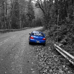 Blue Subaru STI Roadside
