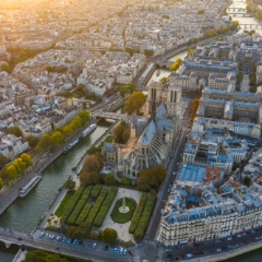Over Paris Ile de la Cite Golden Light DJI Mavic Pro 2.jpg An aerial view of Paris and Notre Dame before the fire.