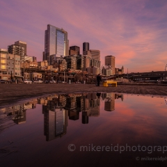 Seattle Sunset Pier Reflecting Pool Seattle's waterfront presents numerous photo opportunities. Views of the Olympic Mountains, Elliott Bay, Puget Sound, Alki Point and back at the Seattle skyline...