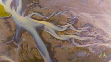 Aerial Braided River Patterns, Iceland – Abstract from Above This mesmerizing aerial photograph captures the intricate braided river patterns of Iceland’s highlands, shot with a DJI Mavic 4 Pro. Glacial meltwater weaves...