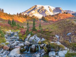 Autumn Glow at Myrtle Falls – Mount Rainier National Park Brilliant autumn colors blanket the alpine meadows above Myrtle Falls as Mount Rainier rises in the crisp morning light. The scene captures the vibrant reds,...