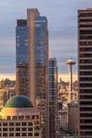 Seattle Space Needle Golden Light A classic Seattle composition looking north up First Avenue, framing the iconic Space Needle between the city’s high-rises in the soft light of dusk. The...