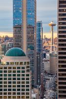 Seattle Space Needle Sunset Up First Avenue A classic Seattle composition looking north up First Avenue, framing the iconic Space Needle between the city’s high-rises in the soft light of dusk. The...