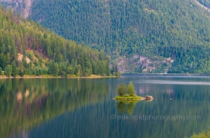Tree Island Reflections on Three Valley Lake, British Columbia | GFX100S A small tree-covered island floats serenely in the still waters of Three Valley Lake, British Columbia. Captured with the Fujifilm GFX100S, this fine art...