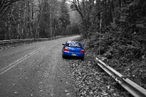 Blue Subaru STI Roadside