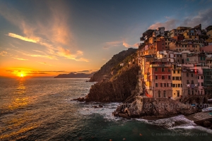 Riomaggiore Sunset Rolling Waves Beautiful sunset light and gentle waves create a memorable scene in Riomaggiore