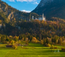 Aerial Castle Neuschwanstein Fall Colors and Meadows.jpg default