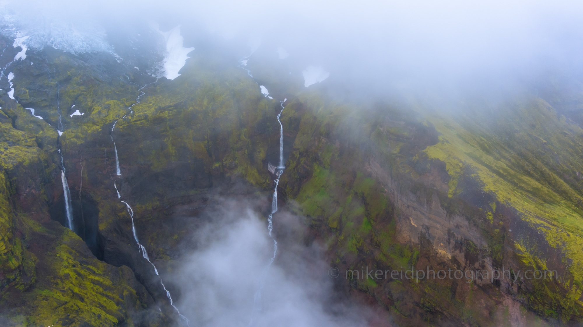 Over Iceland Mountain Falls in the Mist.jpg