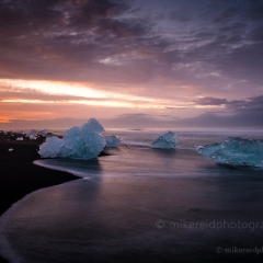 Iceland Jokulsarlon Sunrise Waves Sand.jpg