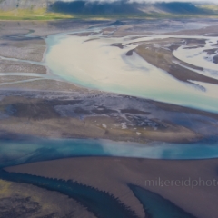 Over Iceland Braided Beach River.jpg To order a print please email me at  Mike Reid Photography : iceland, nordic, ice, glacier, beach, sand, lagoon, sunset, sunrise, sky, skies, jokulsarlon river, water, reflection, romance, evening, night, sky, clouds, landscape, europe,  famous, destination, travel, trip, dream, landscape, light, movement, coast, ocean, vatnajokull, glacial, stokksnes, vestrahorn, puffins, braided rivers, highlands