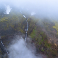 Over Iceland Mountain Falls in the Mist.jpg To order a print please email me at  Mike Reid Photography : iceland, nordic, ice, glacier, beach, sand, lagoon, sunset, sunrise, sky, skies, jokulsarlon river, water, reflection, romance, evening, night, sky, clouds, landscape, europe,  famous, destination, travel, trip, dream, landscape, light, movement, coast, ocean, vatnajokull, glacial, stokksnes, vestrahorn, puffins, braided rivers, highlands