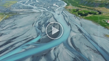 Over Iceland Drone Video River and Bridge.mp4 The aerial perspective above Iceland is not to be missed. Drone or helicopter, these are awe-inspiring views. 7 trips later, I can't wait to go back this year....