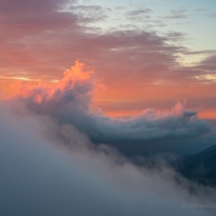 Mount Rainier Fiery Sunset Clouds Wave Cresting.jpg