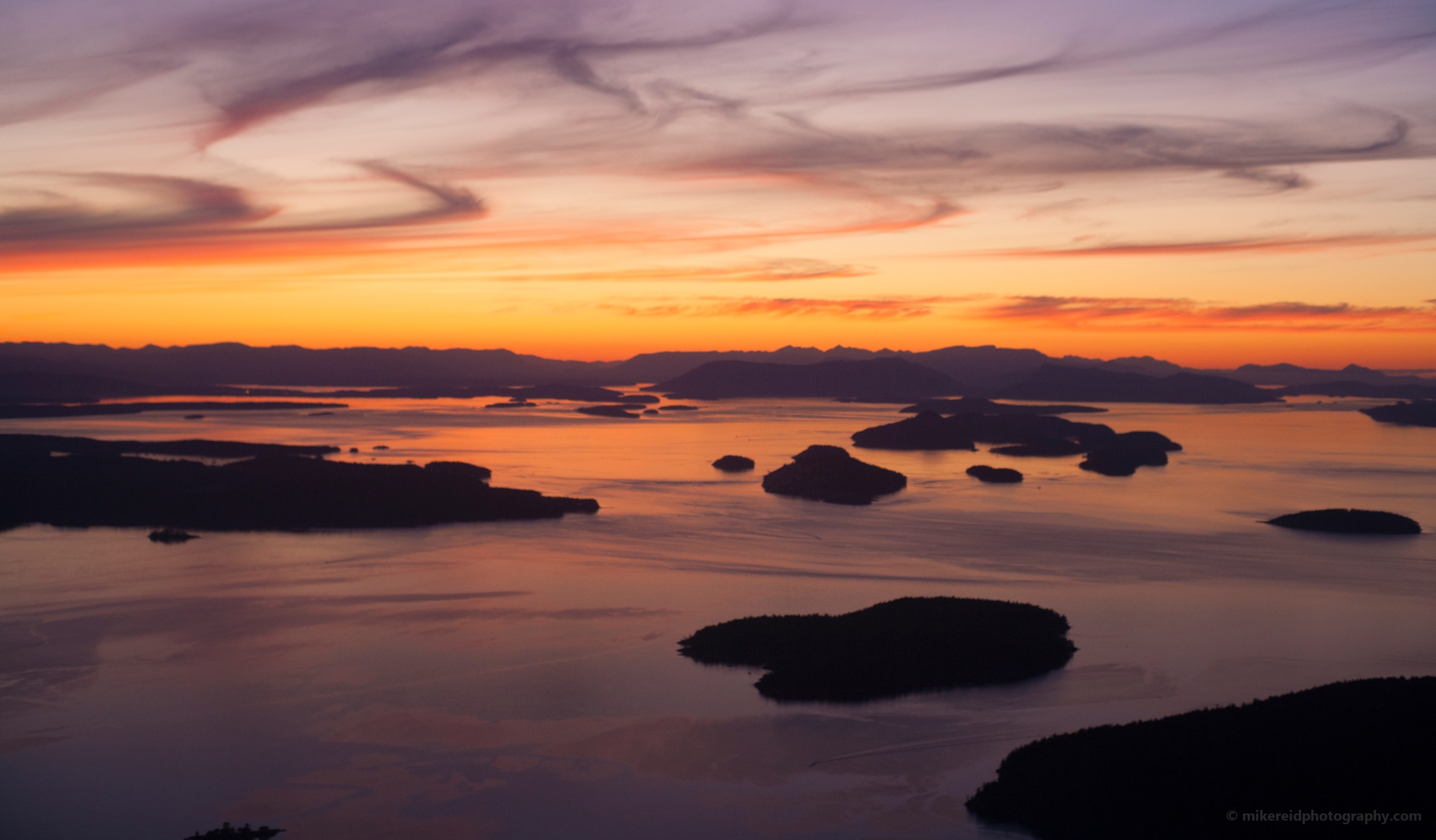 Northwest San Juan Islands Sunset Aerial Spieden Stuart Roche Harbor and Orcas Island 