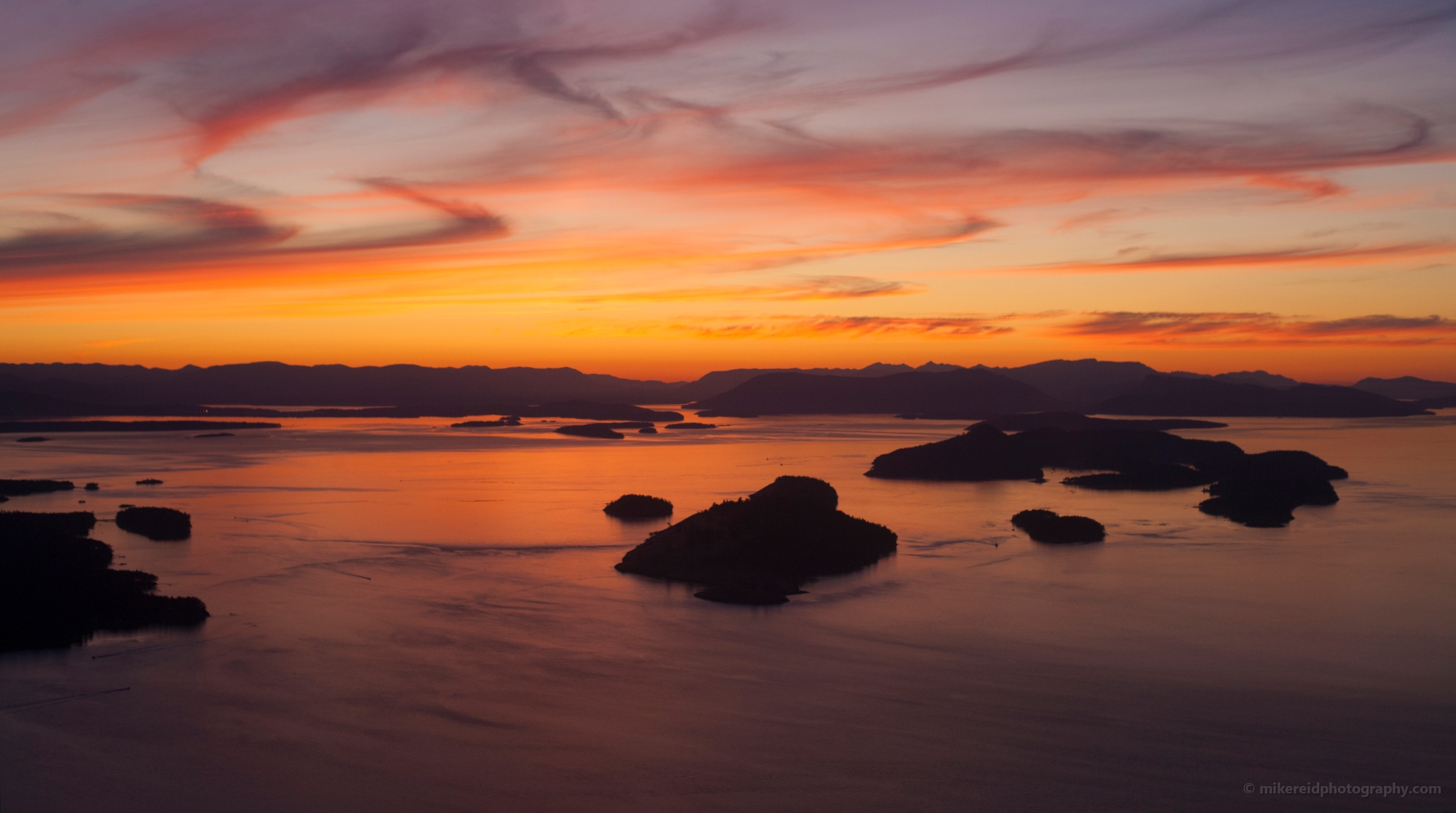 Northwest San Juan Islands Sunset Aerial Spieden and Stuart 2 