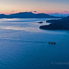 Ferry Coming Home To order a print please email me at  Mike Reid Photography : sunset, sunrise, seattle, northwest photography, dramatic, beautiful, washington, washington state photography, northwest images, seattle skyline, city of seattle, puget sound, aerial san juan islands, reid, mike reid photography