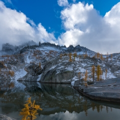 Enchantments Fall Colors Skies Reflected To order a print please email me at  Mike Reid Photography : aasgard pass, enchantments, leavenworth, enchantments lakes basin, prusik, colchuck, snow lakes, northwest, images, leprechaun lake, larches, fall colors, autumn, golden larches, landscape photography, northwest photography, reflection photography, sony mirrorless photography