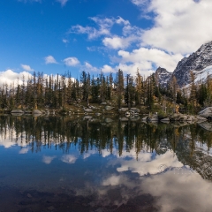 Fall Colors Cloudscape Panorama To order a print please email me at  Mike Reid Photography : alpine lakes, larches, fall colors, enchantments, stuart, ingalls, reflections, mountains, northwest, washington, wenatchee, leavenworth, goats, reflection