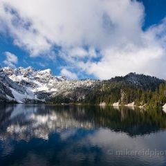 Skies and Mountains Reflected in Snow LAke.jpg