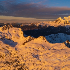 Over the North Cascades Mount Baker and Twin Sisters.jpg Aerial view of the Sisters Range with Mount Baker beyond.