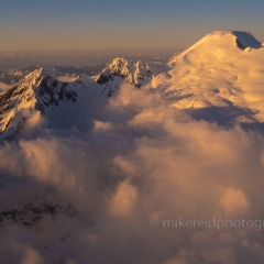 Over the North Cascades Mount Baker in the Clouds To order a print please email me at  Mike Reid Photography : northwest mountains, medium format aerial photography, gfx100s, northwest, washington, Mount rainier, Mount Baker, aerial, drone, drone photography, dji, dji inspire, seattle aerial photography, northwest aerial photography, Skagit, Washington state, landscape photograpy, aerial photography, north cascades, north cascades photography, north cascades peaks