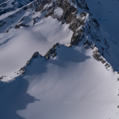 Over the North Cascades Peak Shadows To order a print please email me at  Mike Reid Photography : northwest mountains, medium format aerial photography, gfx100s, northwest, washington, Mount rainier, Mount Baker, aerial, drone, drone photography, dji, dji inspire, seattle aerial photography, northwest aerial photography, Skagit, Washington state, landscape photograpy, aerial photography, north cascades, north cascades photography, north cascades peaks