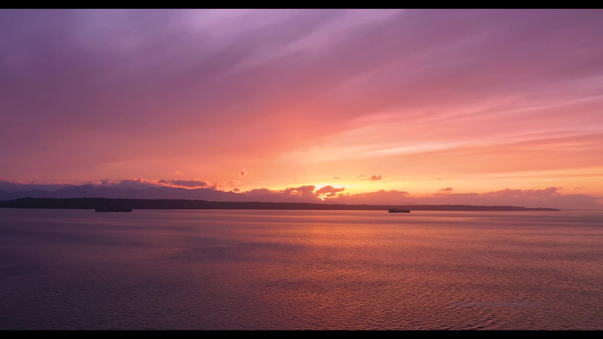 Over Puget Sound Container Ships Sailing at Sunset Drone Video