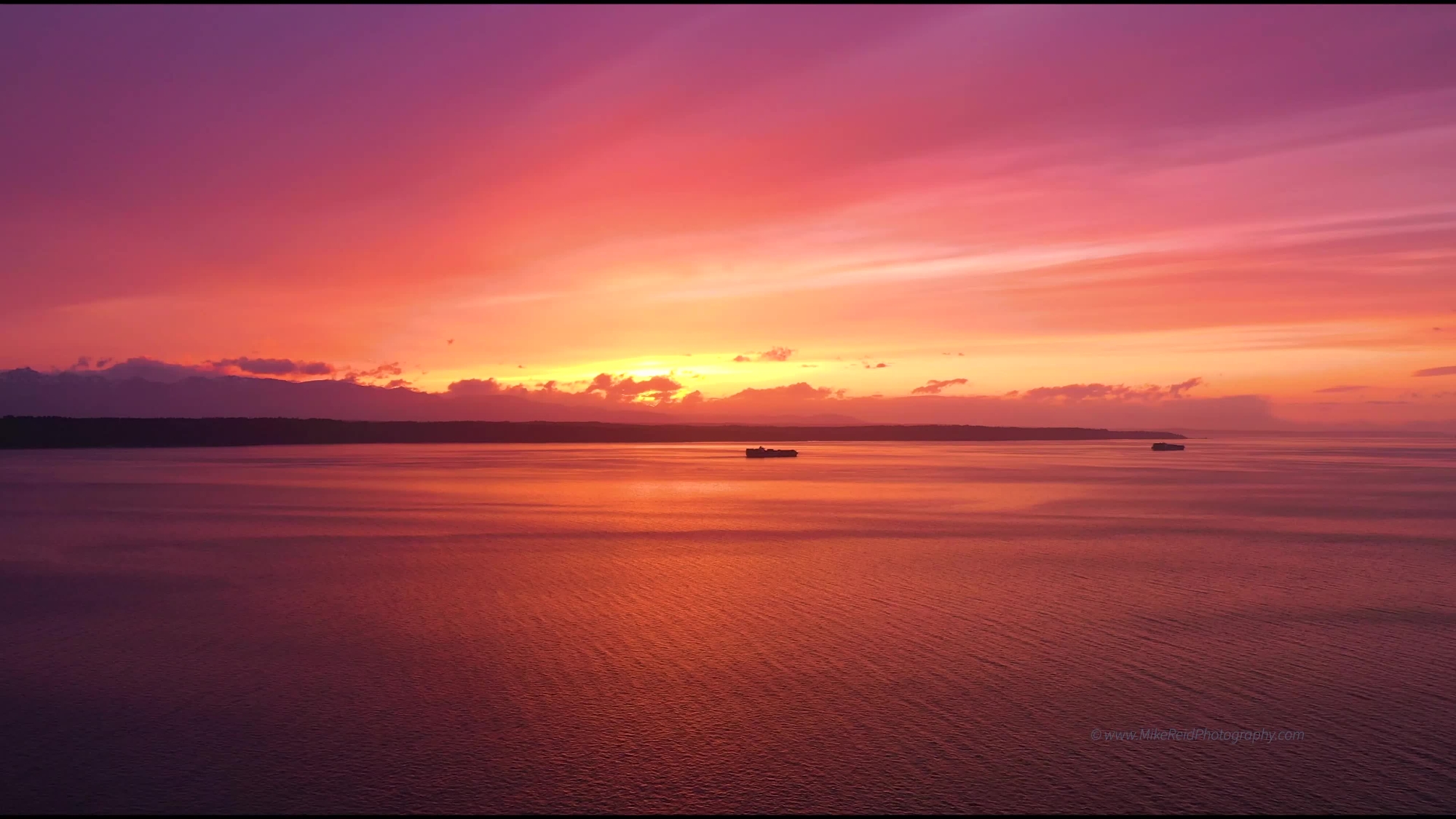Over Puget Sound Container Ships Sunset on the Salish Sea Drone Video
