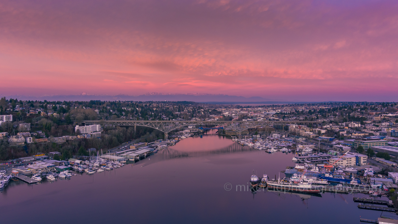 Over Seattle Aurora Bridge Ship Canal Sunrise.jpg Aerial views over Seattle and surroundings in these unique video and photographic perspectives. To arrange a custom Seattle aerial photography tour, please contacct me. #seattle