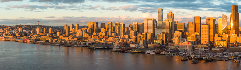 Over Seattle Golden Hour Skyline Panorama.jpg Aerial views over Seattle and surroundings in these unique video and photographic perspectives. To arrange a custom Seattle aerial photography tour, please contacct me. #seattle