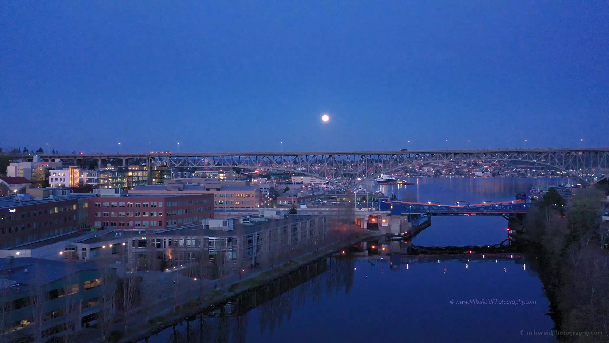 Aerial Seattle Fremont and Ship Canal Moonrise Blue Hour Video