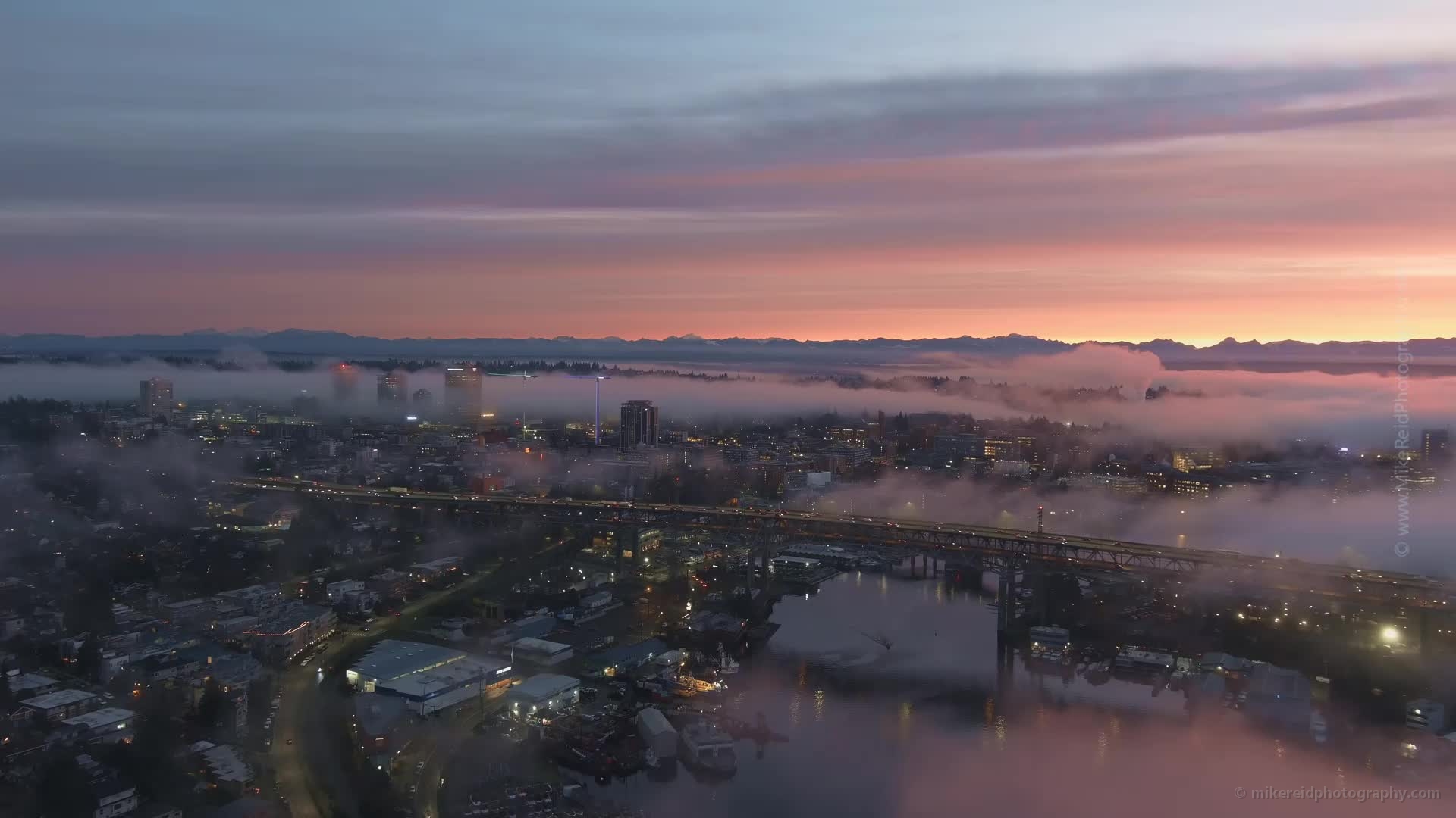 Fog and Traffic Motion Seattle Sunrise Aerial Video