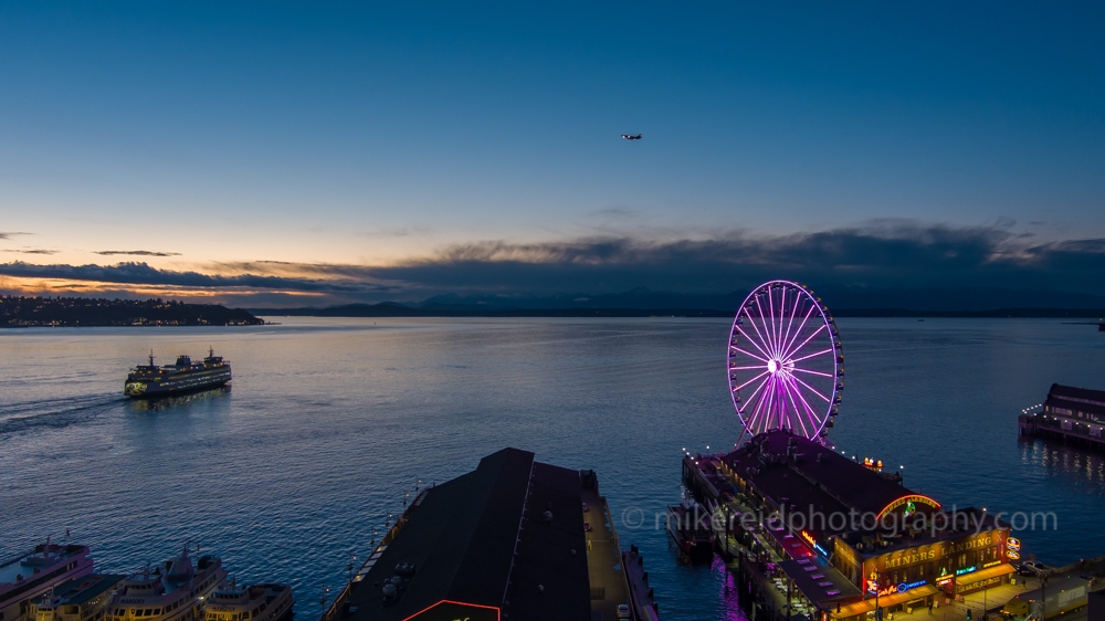 Over Seattle Blue Hour Ferry and Wheel.jpg 