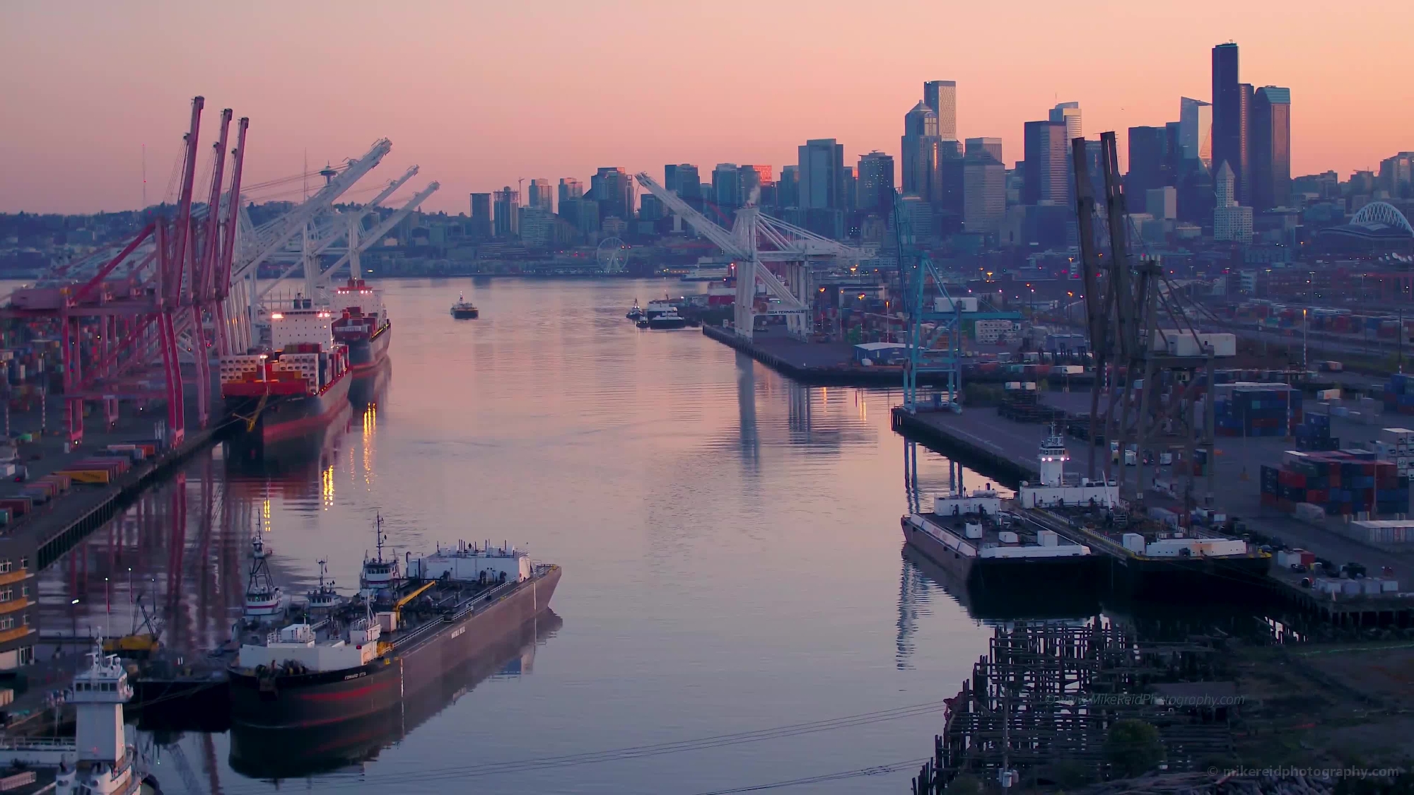 Over Seattle Port and Downtown Reflection Sunrise Aerial Photography Video