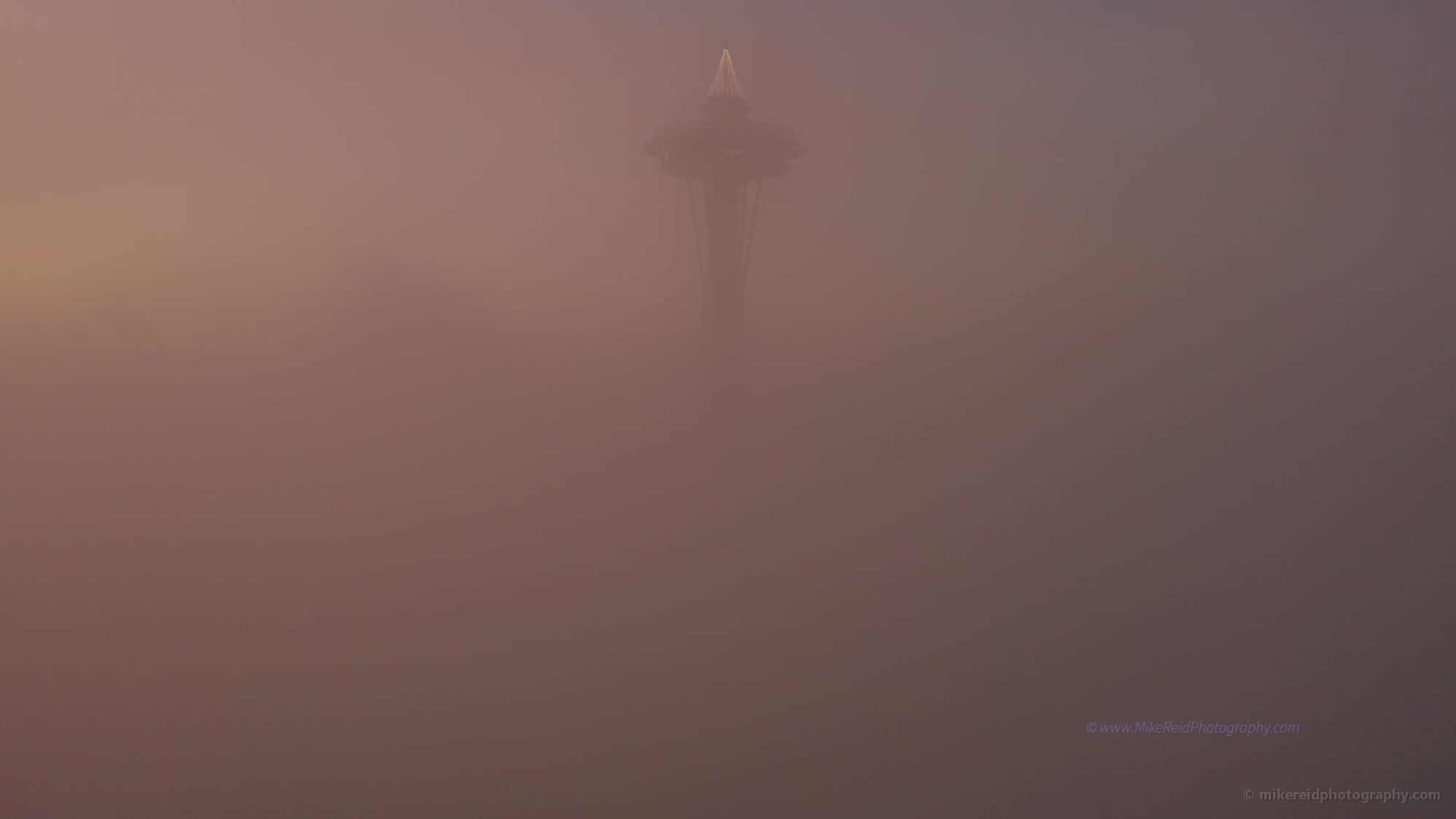 Seattle Space Needle Emerging From the Fog at Sunrise Video