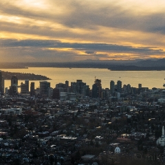Aerial Backside of the Seattle Skyline and Olympic Mountains.jpg