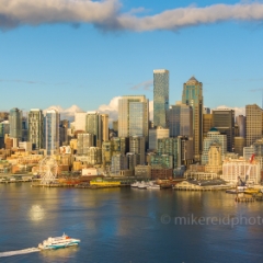 Over Seattle Afternoon Ferry Arrival.jpg To order a print please email me at  Mike Reid Photography : seattle, sky view observatory, svo, zeiss lenses, columbia center, urban, sunrise, fog, sunset, puget sound, elliott bay, space needle, northwest, washington, rainier, aerial, a7r, seattle aerial photography, northwest aerial photography, university of washington, alki, seattle photography