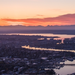 Over Seattle Lake Washington Ship Canal to Bellevue Aerial Drone Sunrise  #seattle #dronephotography #dronevideo #aerial #aerialphotography #aerialvideo #northwest #washingtonstate To order a print please email me at  Mike Reid Photography : seattle, sky view observatory, svo, zeiss lenses, columbia center, urban, sunrise, fog, sunset, puget sound, elliott bay, space needle, northwest, washington, rainier, aerial, a7r, alr2, seattle aerial photography, northwest aerial photography, university of washington, alki, seattle photography