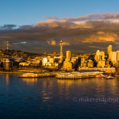 Over Seattle Space Needle Golden Light.jpg To order a print please email me at  Mike Reid Photography : seattle, sky view observatory, svo, zeiss lenses, columbia center, urban, sunrise, fog, sunset, puget sound, elliott bay, space needle, northwest, washington, rainier, aerial, a7r, seattle aerial photography, northwest aerial photography, university of washington, alki, seattle photography, helicopter photography, drone photography