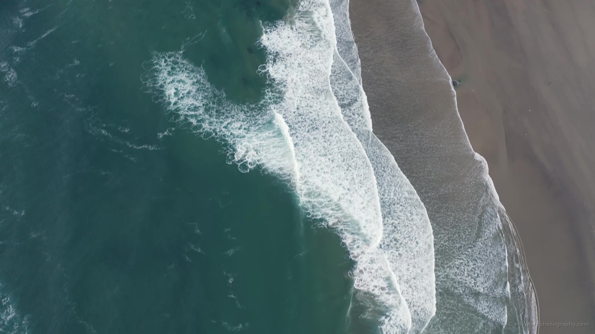 Over Cannon Beach Morning Light and Waves Video
