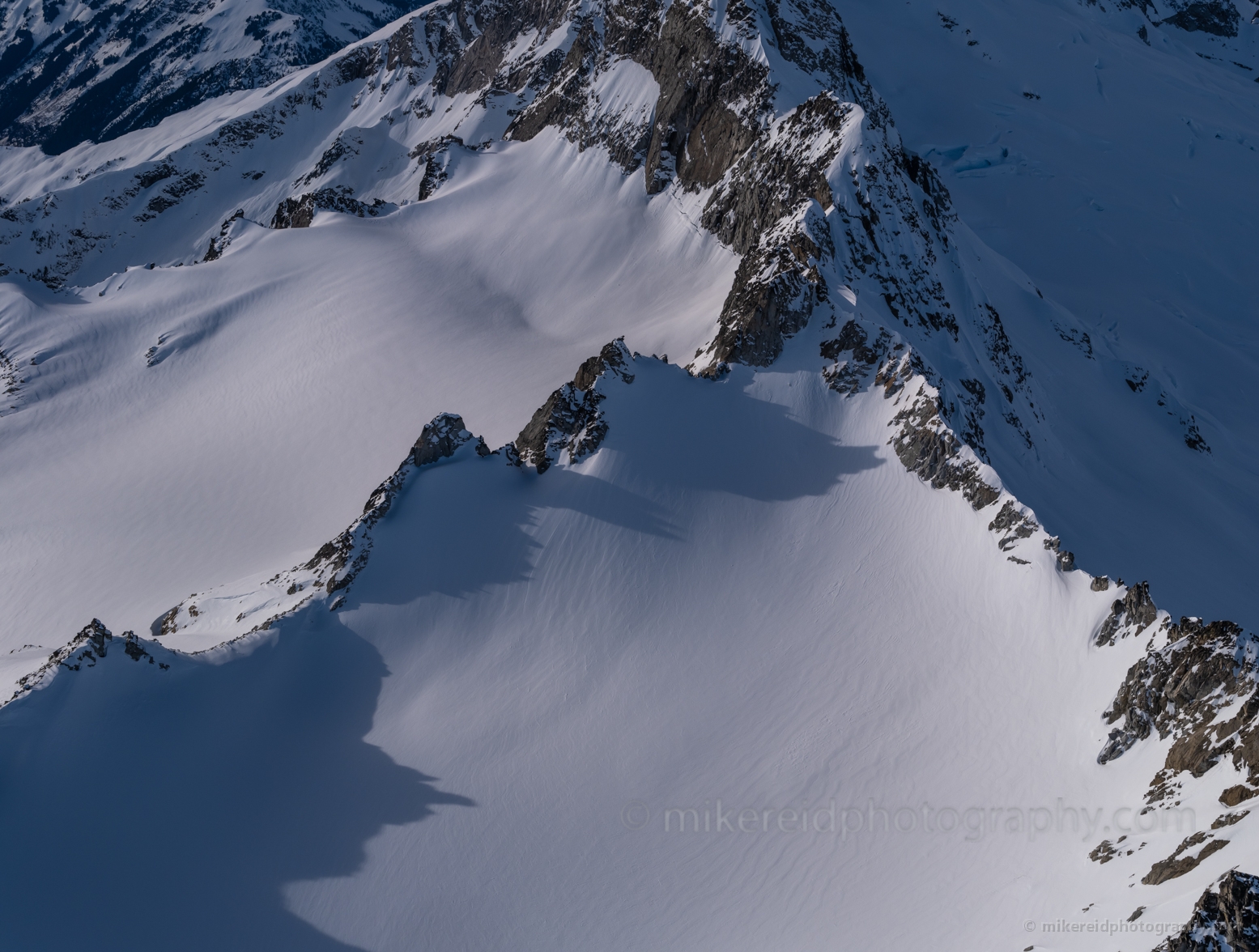 Over the North Cascades Peak Shadows