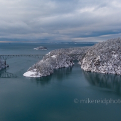 Northwest Aerial Photography Over Deception Pass Bridge Calm Winter Snow.jpg