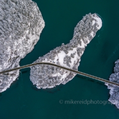 Northwest Aerial Photography Over Deception Pass Bridge Winter Snow Pass Island.jpg