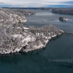 Northwest Aerial Photography Over Deception Pass Bridge Winter Snow.jpg