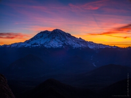 Mount Rainier Sunrise from High Rock Lookout – 50mm Fine Art Landscape The first light of dawn paints Mount Rainier in deep blues and fiery orange hues as seen from High Rock Lookout. Captured with a 50mm lens for natural...