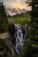 Myrtle Falls at Dusk – Mount Rainier National Park Soft evening light glows over Myrtle Falls and Mount Rainier as twilight settles across the Paradise meadows. The cascading waterfall tumbles through alpine...