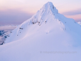 Over the North Cascades Mount Shuksan Summit Pyramid An inspiring aerial closeup of Mount Shuksan’s Summit Pyramid, one of the Pacific Northwest’s most sought-after alpine climbs. Captured in soft morning light...