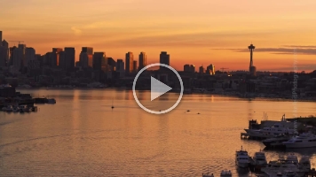 Seattle Lake Union Sunset X7 0008 A serene aerial view over Seattle’s Lake Union at sunset, capturing glowing reflections, boats, and the city skyline bathed in warm evening light — a tranquil...