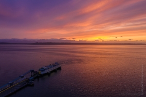 Over Edmonds Ferry Docking at Sunset Fiery Skies Aerial.jpg