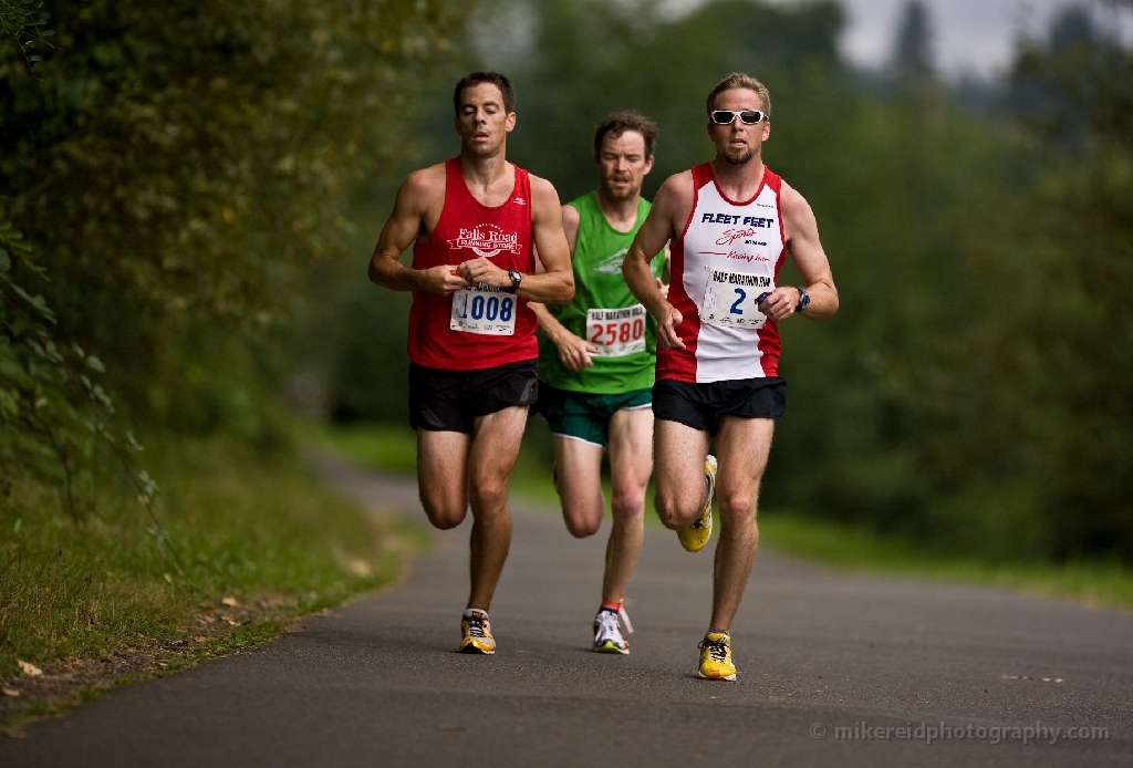 three marathon runners